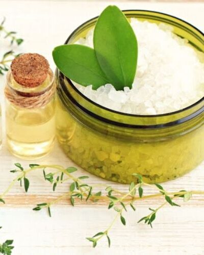 Make this Epsom salt scrub recipe with essential oils for natural pain relief of fibromyalgia symptoms and sore muscles or joint pain.