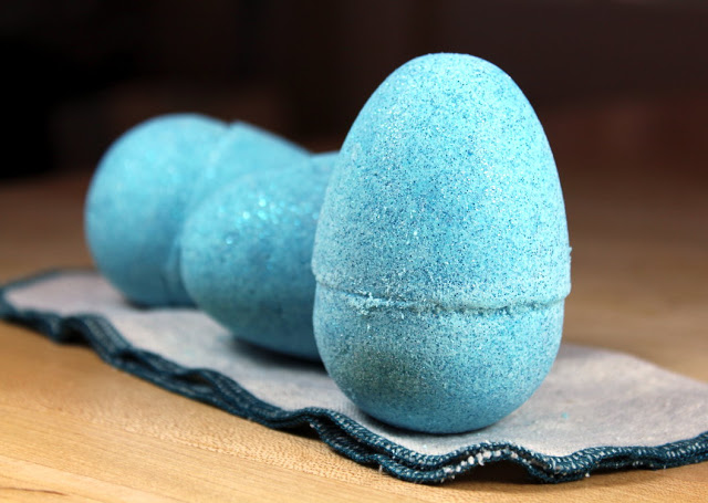 Easter Egg Bath Bombs Recipe. Fun Easter basket filler ideas. These DIY Easter egg bath bombs add a bit of fun to bath time no matter your age! The perfect non-candy Easter basket filler for tweens, teens and even adults, these DIY Easter egg bath bombs add an abundance of bubbles, color and sparkling glitter to your bath time experience. Plus, they also nourish and hydrate dry skin with natural ingredients like cocoa butter, babassu oil and yogurt powder. Make these for your Easter baskets! Easter Egg Bath Bombs Recipe. Fun Easter basket filler ideas. These DIY Easter egg bath bombs add a bit of fun to bath time no matter your age! The perfect non-candy Easter basket filler for tweens, teens and even adults, these DIY Easter egg bath bombs add an abundance of bubbles, color and sparkling glitter to your bath time experience. Plus, they also nourish and hydrate dry skin with natural ingredients like cocoa butter, babassu oil and yogurt powder. Make these for your Easter baskets!
