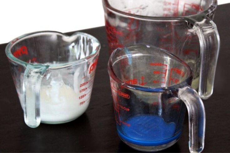 melted glycerin soap base in clear, white and blue for making melt and pour soap