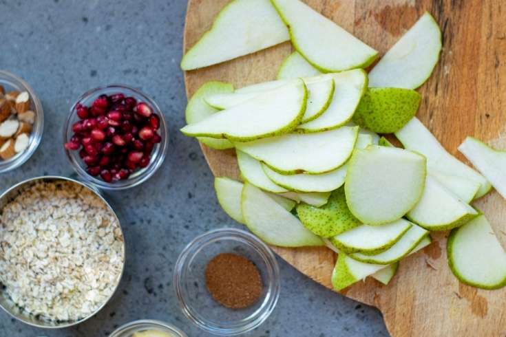 slice pears on cutting board