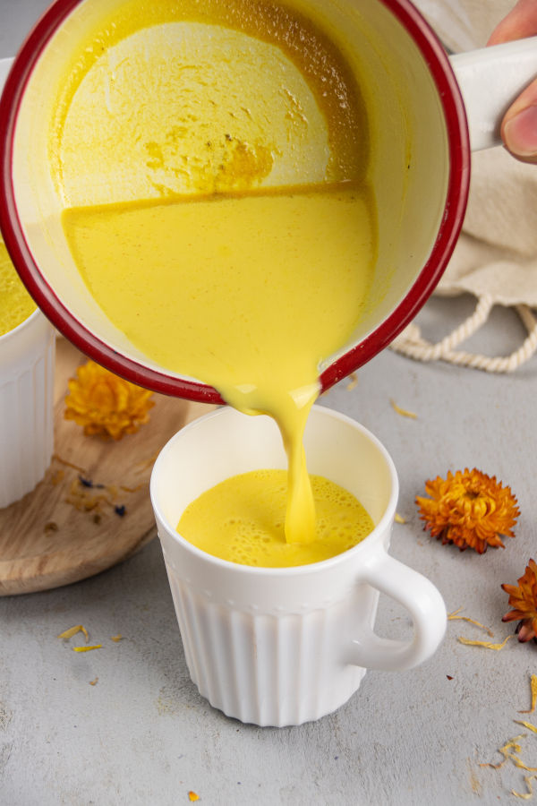 Discover golden milk benefits and learn how to make a healthy golden milk latte recipe to nourish your mind and body. Golden milk is a powerhouse of health benefits and can support your body and mind in several ways. Made with turmeric and honey, golden milk is a healthy and delicious drink that can boost immunity, reduce inflammation, promote sleep and aid with digestion. This homemade remedy is perfect for cold and flu season as it's a great way to naturally support your immune system.