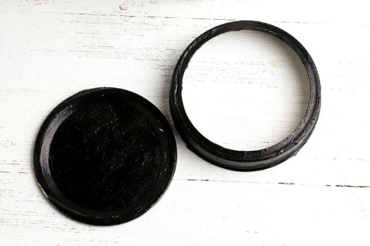 paint mason jar lids with black craft paint for how to make snowman mason jar food gifts