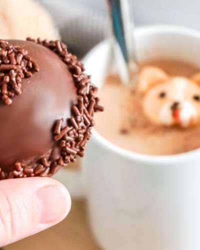 How to Make Hot Chocolate Bombs with Marshmallows. Making hot chocolate bombs requires a little bit of work. But it's worth the effort. Especially when Corgi marshmallows appear in your mug of hot chocolate once the hot cocoa bombs have melted on the outside. Discovers instructions and photographs on how to make hot chocolate bombs with Corgi marshmallows, how to temper chocolate, ways to melt chocolate and the types of molds you can use to make hot chocolate bombs as a warming winter treat.