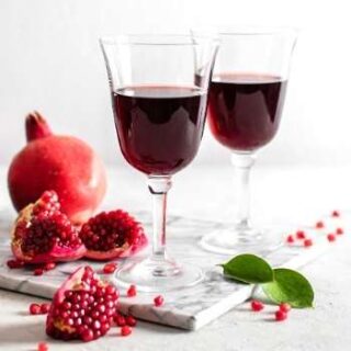 This pomegranate cider recipe is a flavorful twist on spiced apple cider. Make this delicious apple pomegranate cider recipe for your next holiday party. This warm winter drink recipe is easy to make on the stove top or crockpot. You will love the flavors of pomegranate, apple cider and warm spices that give it a complex flavor. For the adults as easy pomegranate drink recipes for Christmas drinks and holiday parties, add some rum or whiskey for a warm alcoholic winter drink.