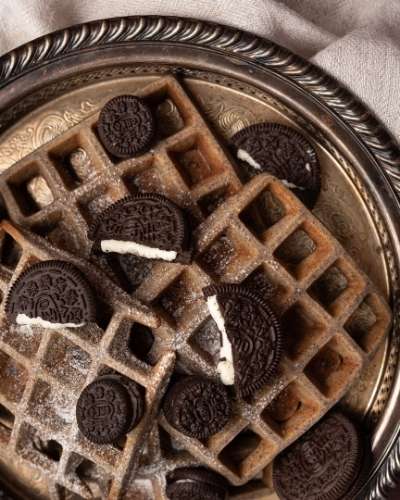 Learn how to make Oreo waffles in a waffle iron from scratch or with pancake mix for a fun twist on this classic breakfast recipe.