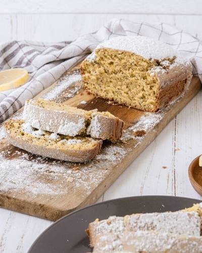 How to make a delicious moist poppy seed cake recipe. This recipe for lemon poppy seed loaf cake is one of the best light desserts for spring or summer. Serve it at brunch, as a spring dessert recipe or as a snack. This easy recipe has lemon juice and lemon zest and poppy seeds for a delicious flavor. It’s dairy free and egg free, so it’s a good citrus dessert for those with food allergies.