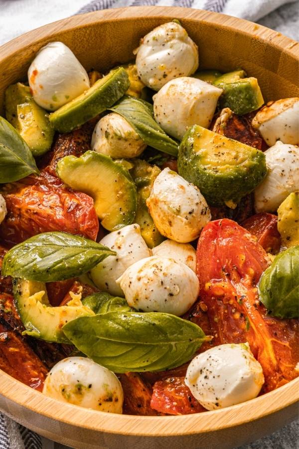 caprese salad with roasted tomatoes and avocado