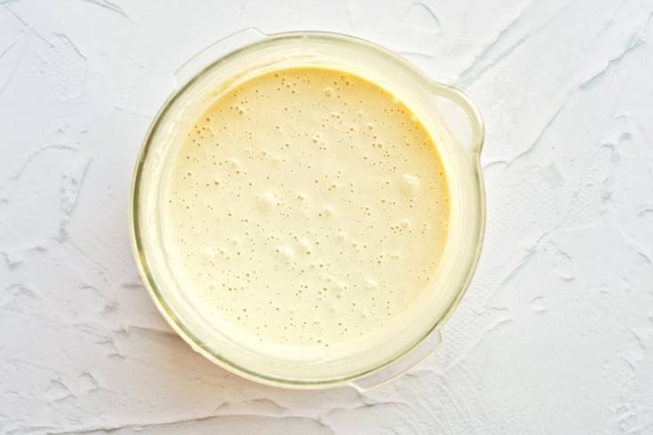 yule log cake batter in mixing bowl